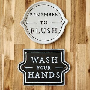 Two bathroom signs from Hearth & Hand with Magnolia by Joanna Gaines